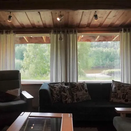 Tolonen A Beautiful Log By The River