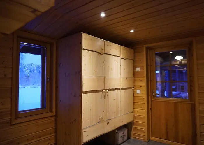 Tolonen A Beautiful Log By The River Ивало