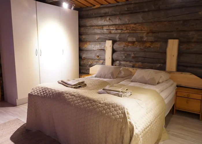 Tolonen A Beautiful Log By The River Ивало