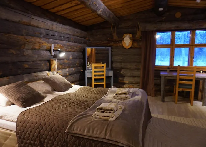 Tolonen A Beautiful Log By The River Ивало