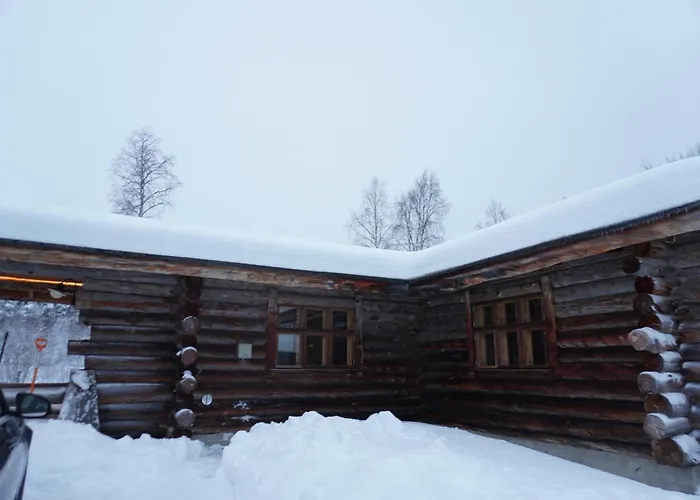 Tolonen A Beautiful Log By The River Ивало